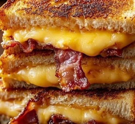 Delicious bacon grilled cheese sandwich with crispy bacon and melted cheese