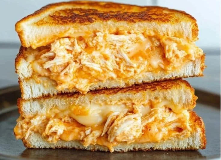 Buffalo Chicken Grilled Cheese sandwich with melted cheese and spicy buffalo sauce