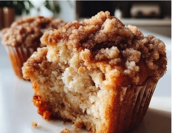 Delicious and fluffy banana streusel muffins with a crunchy topping