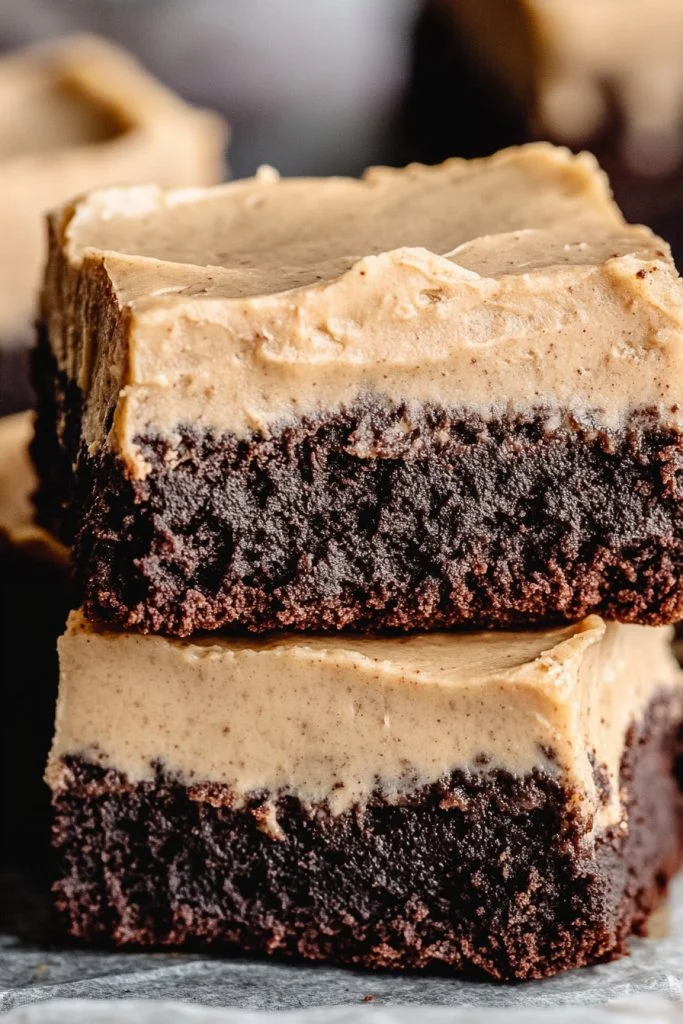 Decadent frosted coffee brownies topped with creamy coffee frosting