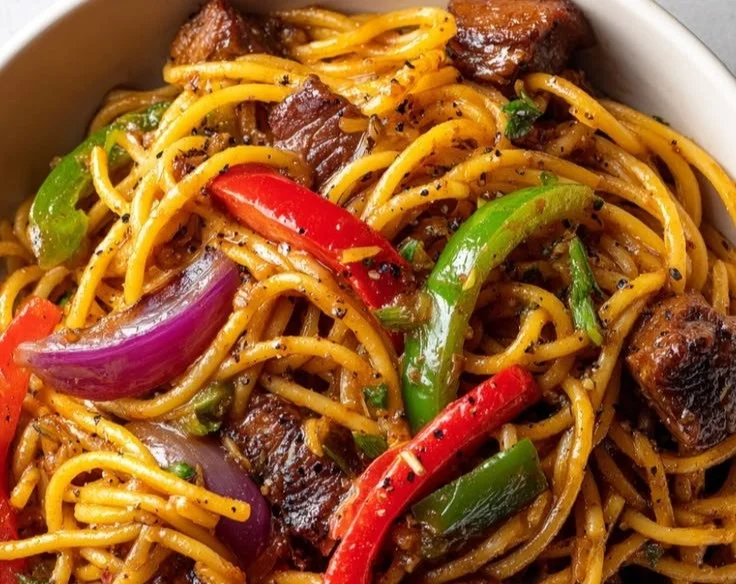 A vibrant brimming spaghetti bowl filled with delicious pasta.