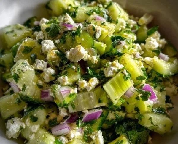 Bowl of Celery Feta Salad with fresh ingredients and dressing