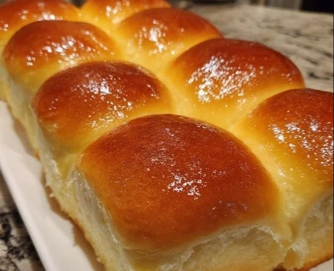 Homemade Hawaiian Sweet Rolls fresh out of the oven, golden and fluffy.