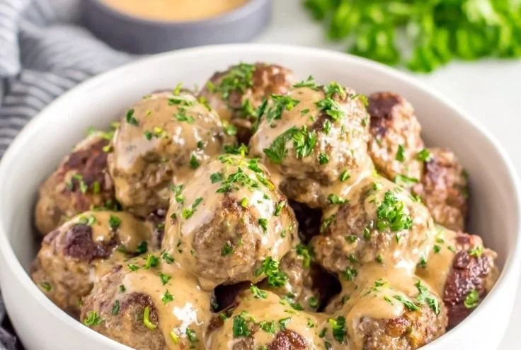 Delicious Instant Pot Swedish meatballs served with creamy gravy.