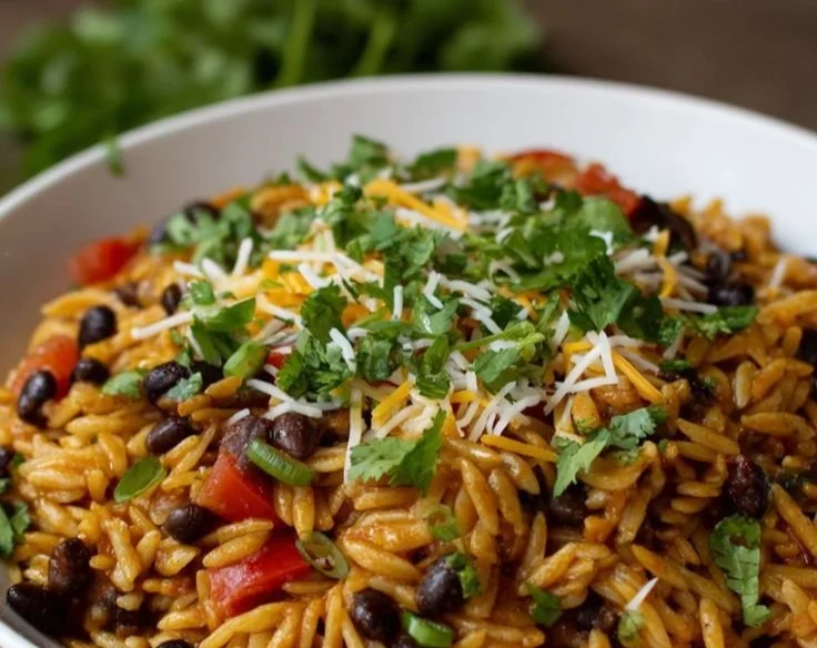Delicious One-Pot Taco Orzo garnished with fresh ingredients