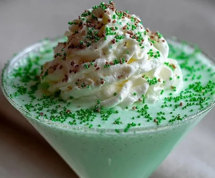 Shamrock Shake Martini featuring creamy mint flavor in a festive glass.