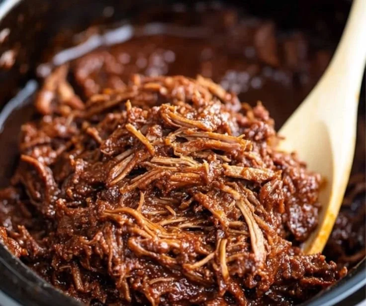 Delicious slow cooker BBQ pulled beef served in a bun