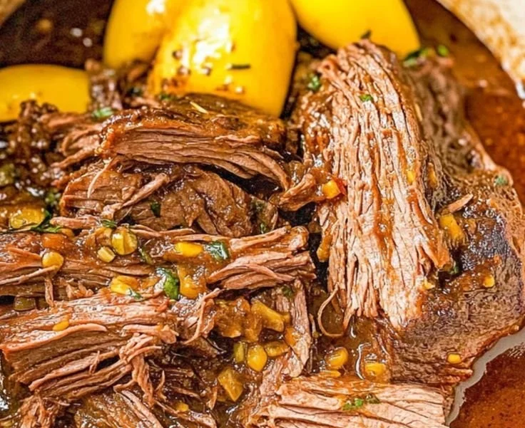 Delicious Slow Cooker Mississippi Pot Roast served with vegetables