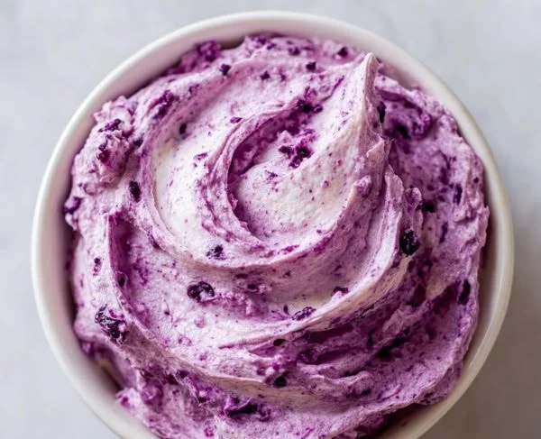 Homemade whipped blueberry butter spread on toast