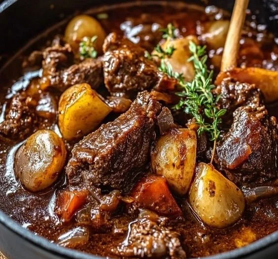 Delicious plate of Beef Stifado with tender beef and aromatic spices.