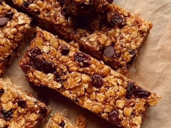 Chewy granola bars made from oats, nuts, and dried fruit for a healthy snack.
