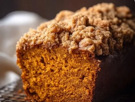 Homemade Cinnamon Crumb Pumpkin Bread with a delicious topping