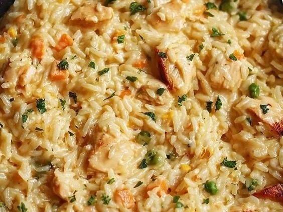 Creamy chicken and rice skillet dish ready to serve, highlighting the creamy texture and ingredients