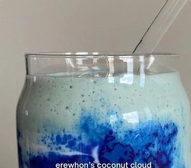Delicious creamy coconut smoothie with fresh coconut and tropical fruits