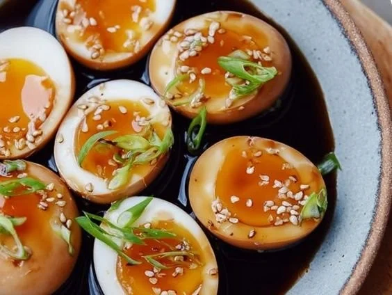 Delicious soy sauce eggs garnished and ready to serve