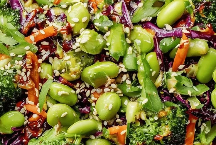 A vibrant and healthy fresh broccoli salad with colorful vegetables and dressing