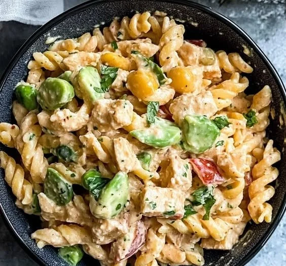 High-protein tuna pasta salad with fresh vegetables and dressing