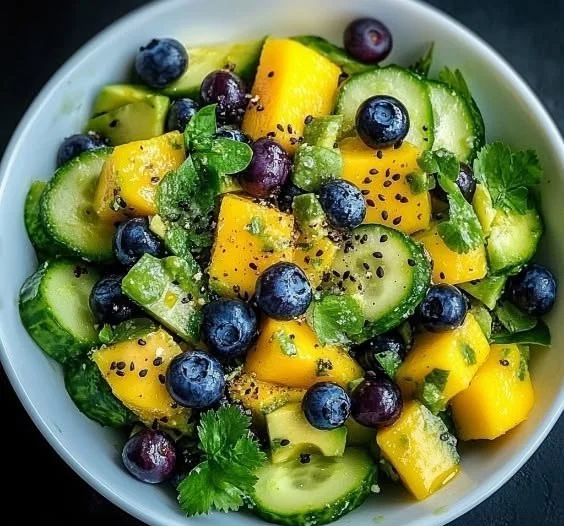 Delicious mango cucumber salad with vibrant colors and fresh ingredients.