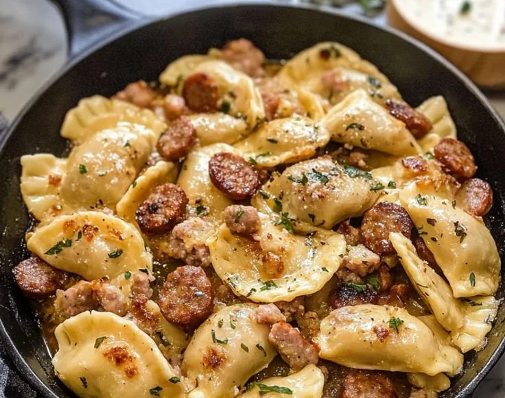 Skillet Perogies and Sausage dish served in a frying pan