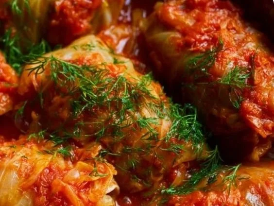 Delicious stuffed cabbage recipe by Ina Garten with ingredients and preparation steps.