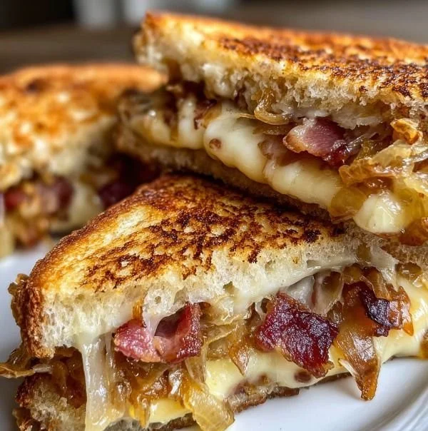 Bacon and Caramelized Onion Grilled Cheese Sandwich on a plate