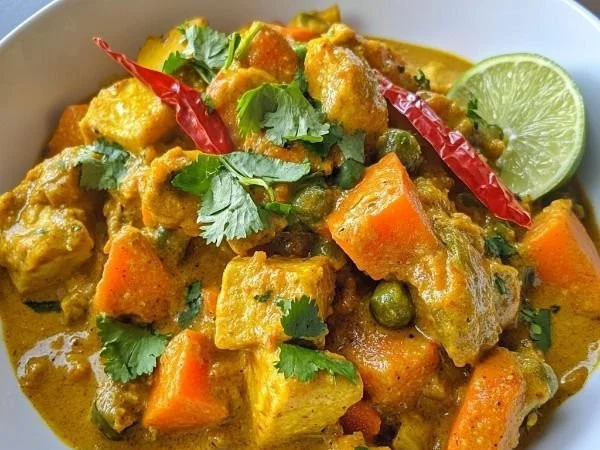 Colorful Caribbean vegetable curry with vibrant spices and fresh vegetables